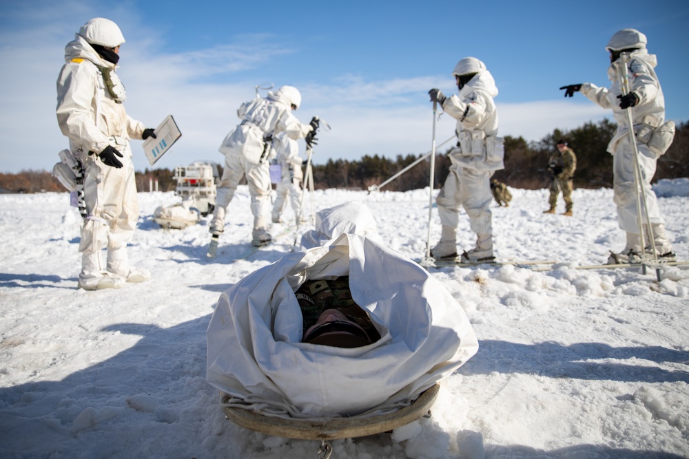 JGSDF Soldiers Demonstrate How to Use an Ahkio Medical Sled at Hokkaido-En Large Training Area