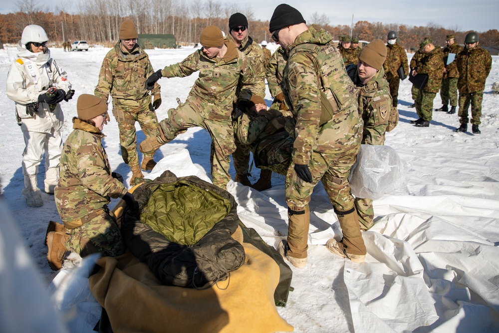 1-5 Infantry Soldiers Practice Loading an Ahkio Medical Sled