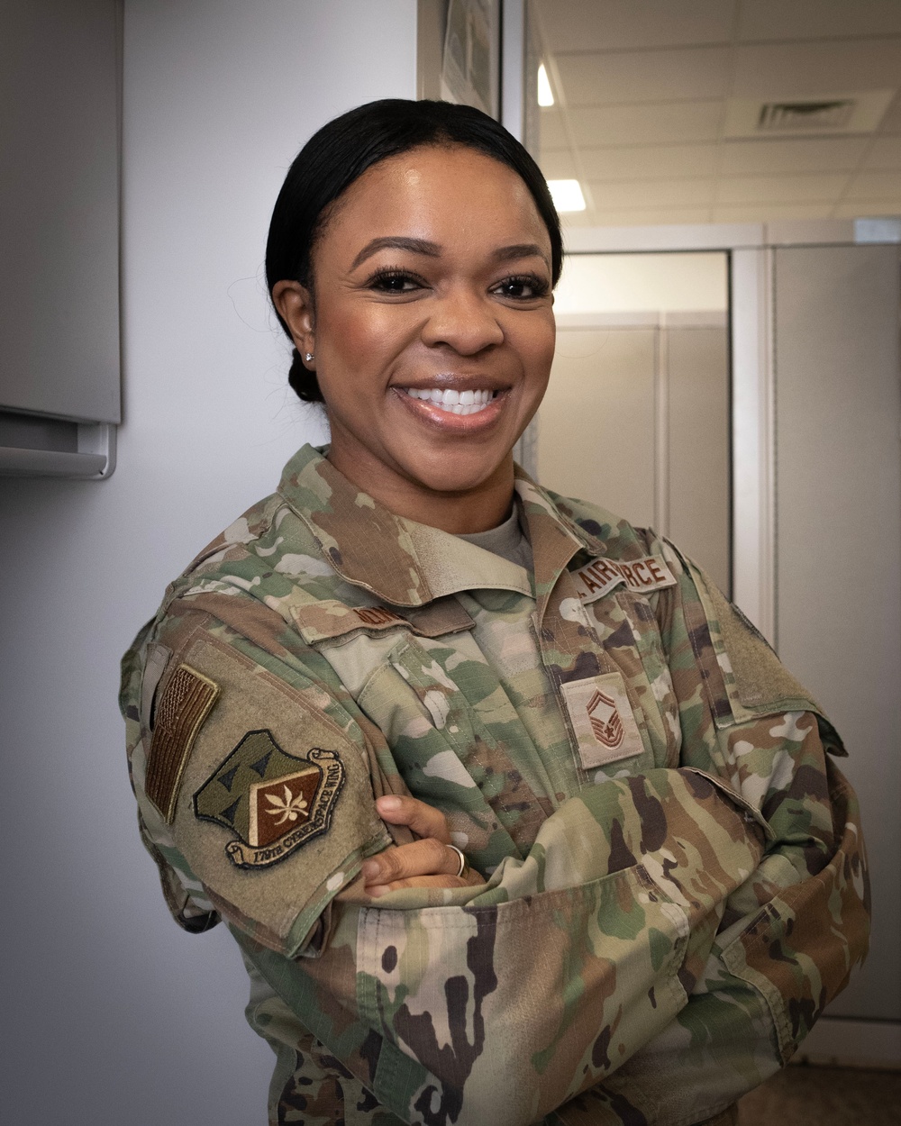 U.S. Air Force Senior Master Sgt. Natalie Jones, a member of the 179th Cyberspace Wing (179CW), poses for a photo while reflecting on her journey in the Air National Guard.