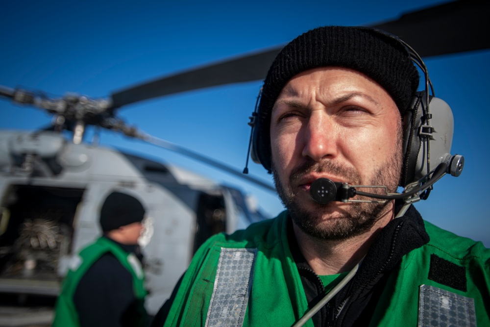 Sailor Observes Flight Operations