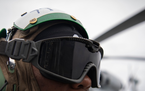 Sailor Observes Flight Operations