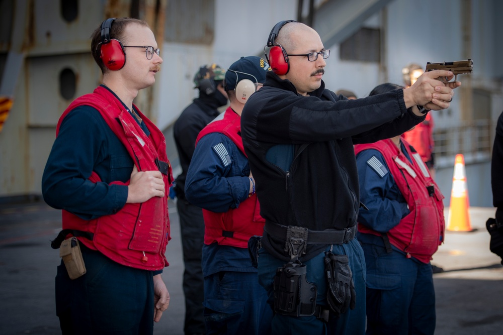 Nimitz Sailors Participate in a Small Arms Gun Shoot