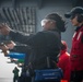 Nimitz Sailors Participate in a Small Arms Gun Shoot