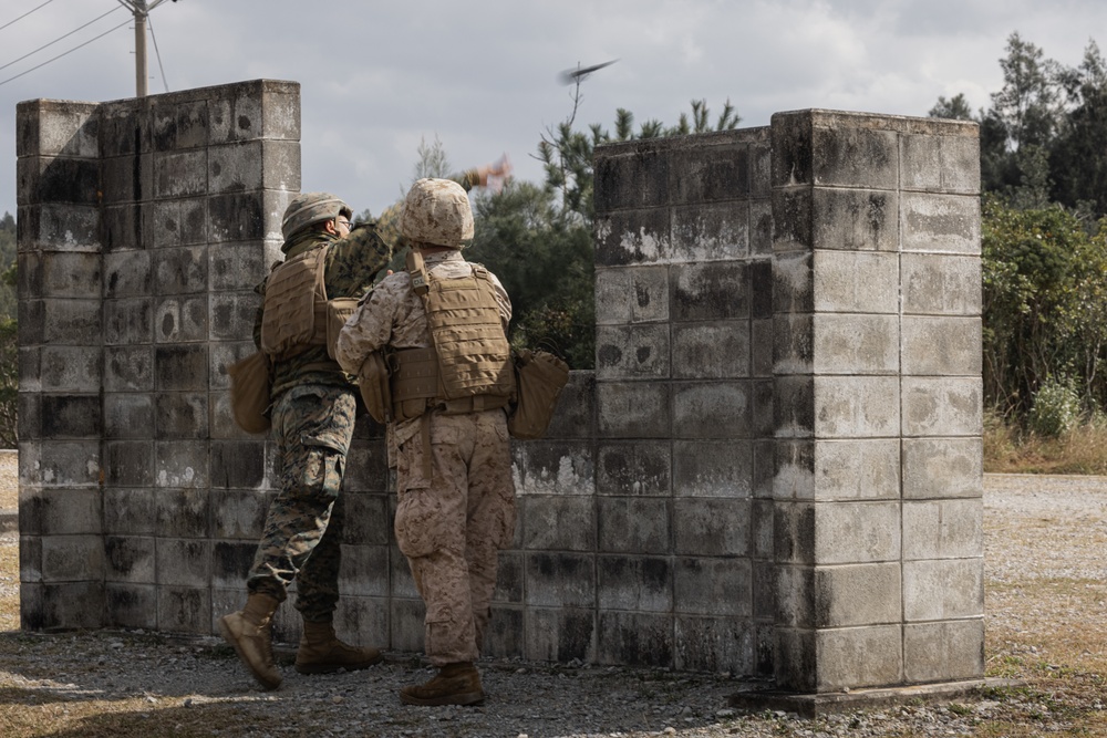 Headline: 7th Communication Battalion Stormbreaker 25.1 | Marines Throw Grenades Down Range