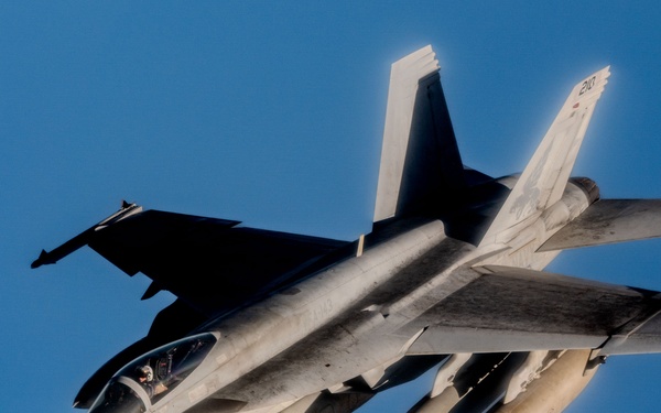 AFCENT tankers team up with NAVCENT fighters to execute mission over USCENTCOM AOR