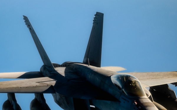 AFCENT tankers team up with NAVCENT fighters to execute mission over USCENTCOM AOR