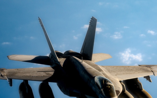 AFCENT tankers team up with NAVCENT fighters to execute mission over USCENTCOM AOR