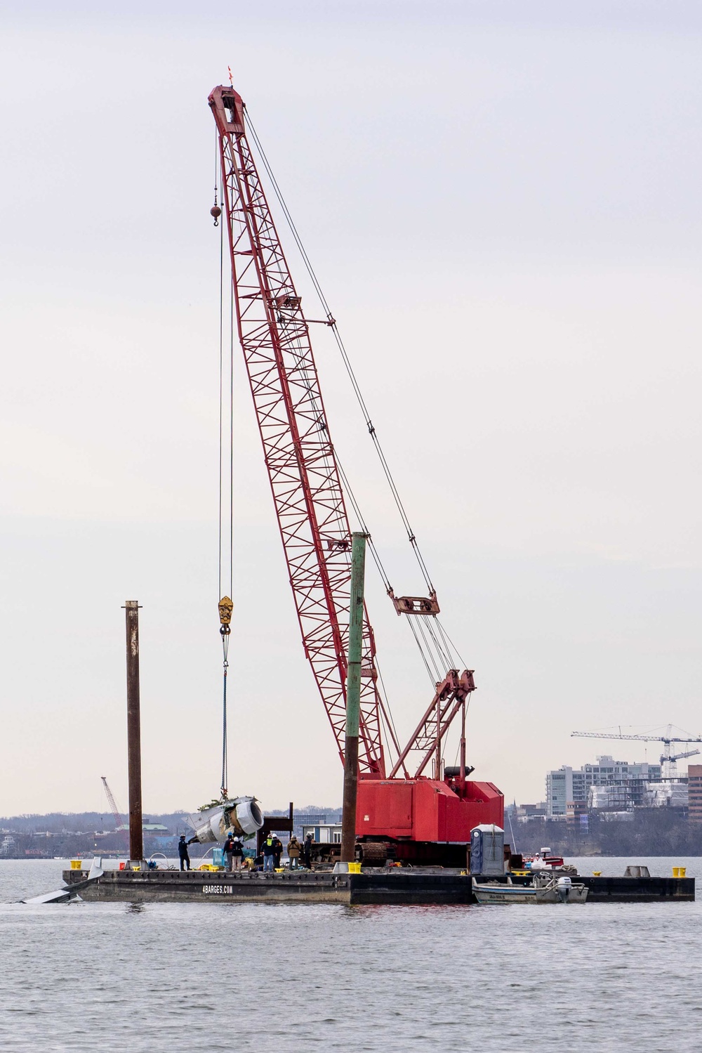 U.S. Army Corps of Engineers crews commence wreckage removal operations at site of Potomac River Aviation Incident