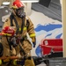 USS Tripoli Sailors Practice 8010 Fire Drill