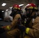 USS Tripoli Sailors Practice 8010 Fire Drill