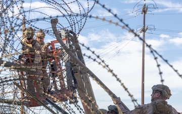 U.S. Marines place concertina wire to assist with border security mission