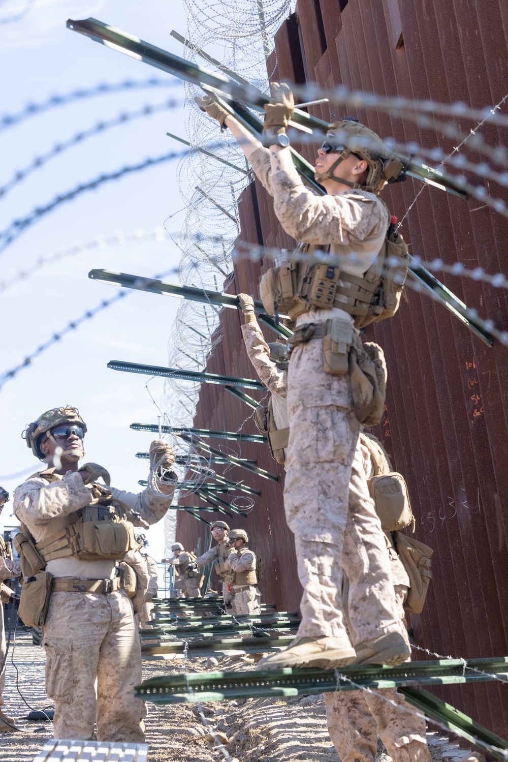 U.S. Marines place concertina wire to assist with border security mission