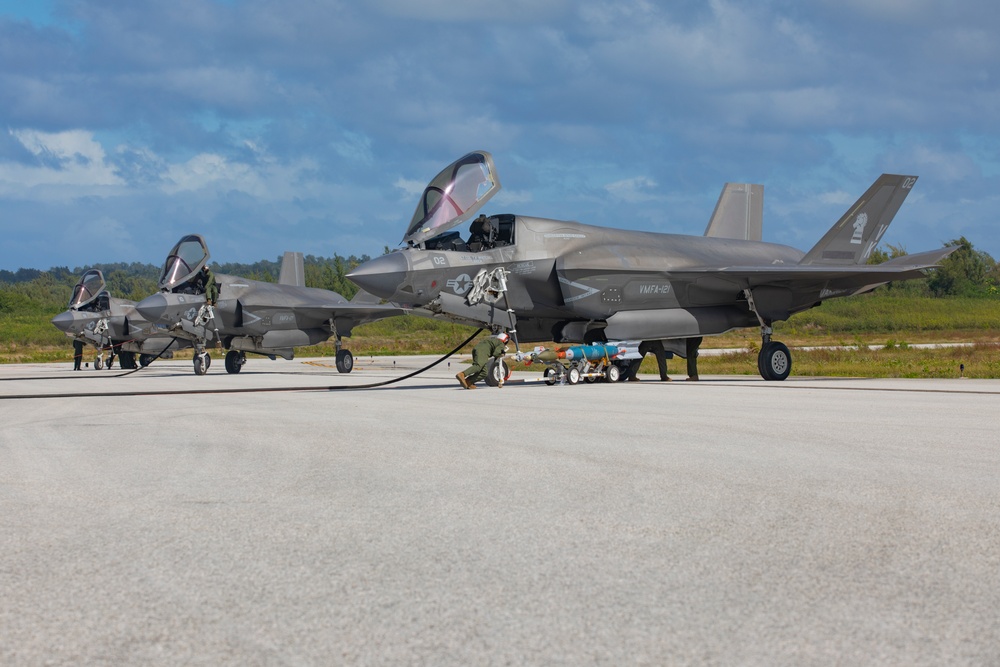 U.S. Marine Corps F-35Bs refuel and arm at Tinian