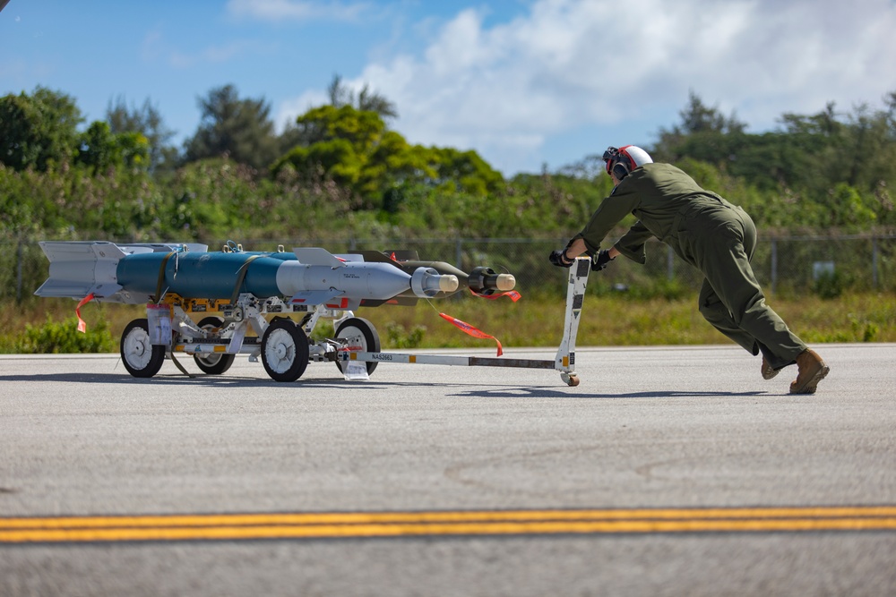 U.S. Marine Corps F-35Bs refuel and arm at Tinian