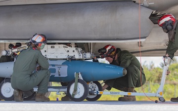 U.S. Marine Corps F-35Bs refuel and arm at Tinian