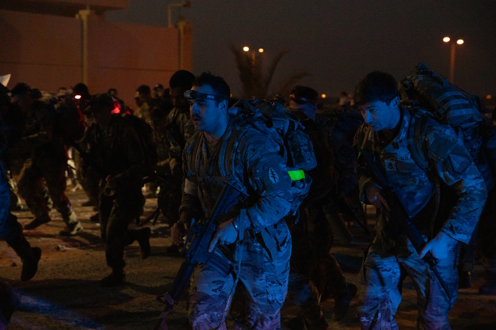 Best Warrior competitors complete a 15km ruck march