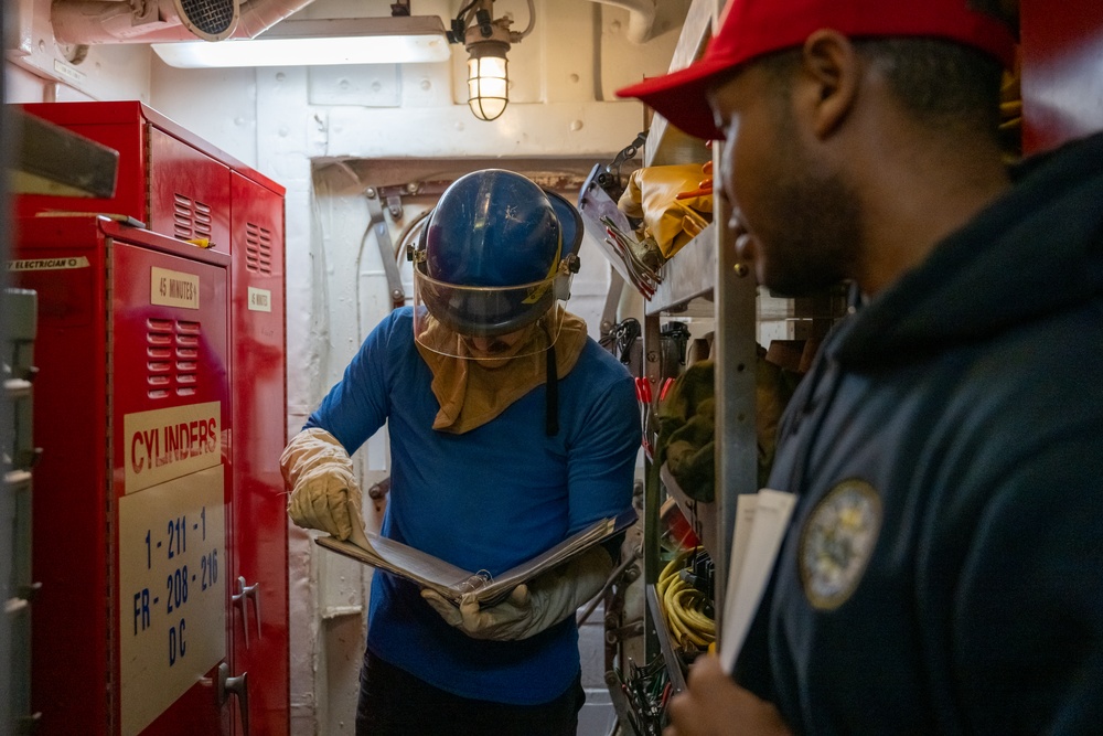 USCGC Polar Star (WAGB 10) crewmembers conduct damage control training in McMurdo Sound during Operation Deep Freeze