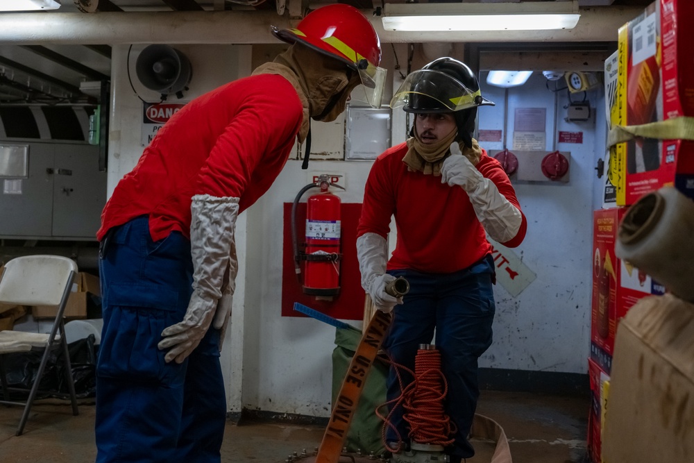 USCGC Polar Star (WAGB 10) crewmembers conduct damage control training in McMurdo Sound during Operation Deep Freeze