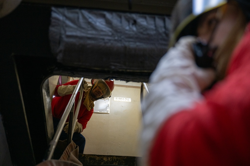 USCGC Polar Star (WAGB 10) crewmembers conduct damage control training in McMurdo Sound during Operation Deep Freeze