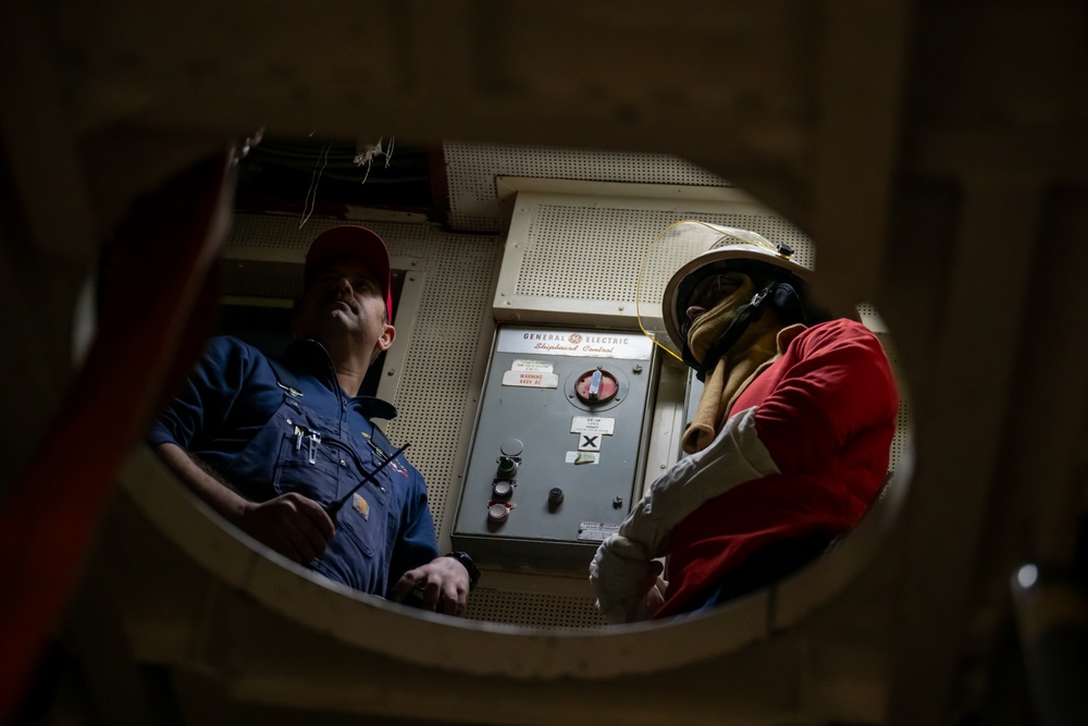 USCGC Polar Star (WAGB 10) crewmembers conduct damage control training in McMurdo Sound during Operation Deep Freeze