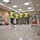 Construction Staff with OICC MCM Check Floor Quality in a Building Nearing Completion