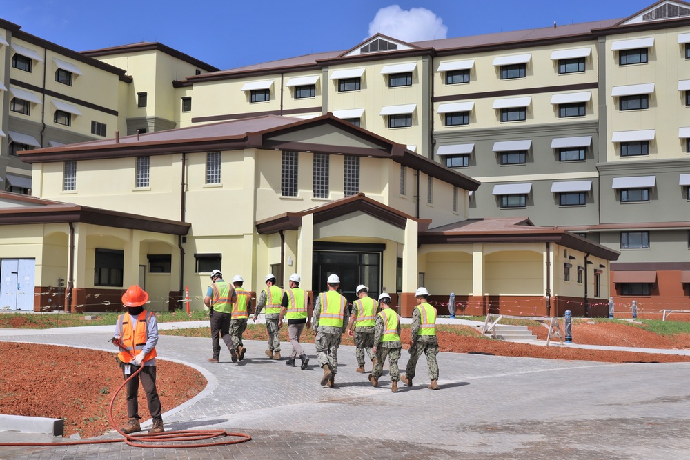 OICC Staff Walk Through Bachelor Enlisted Quarters Under Construction on Marine Corps Base Camp Blaz