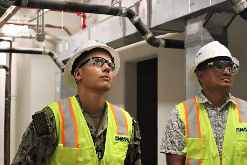 An Officer with OICC MCM Checks the Installation of HVAC Equipment on Camp Blaz