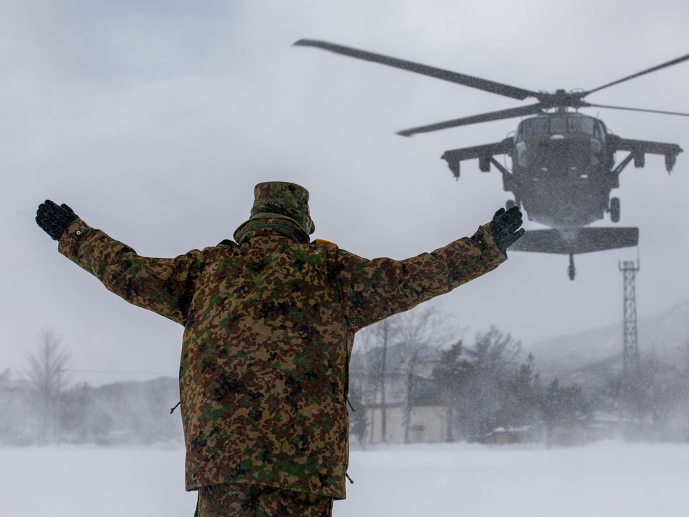 JGSDF Member Hails a U.S. Blackhawk