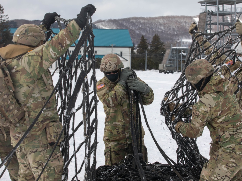 U.S. Army Soldiers Prepare a Cargo Net