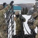 U.S. Army Soldiers Prepare a Cargo Net