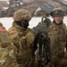 U.S. Army Pfc. Inspects a Cargo Net