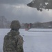 U.S. Army Pfc. Watches a Blackhawk Take Off