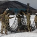 U.S. Army Soldiers Prepare a Cargo Net