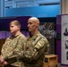 Soldiers observe the Operation Tidal Wave exhibition