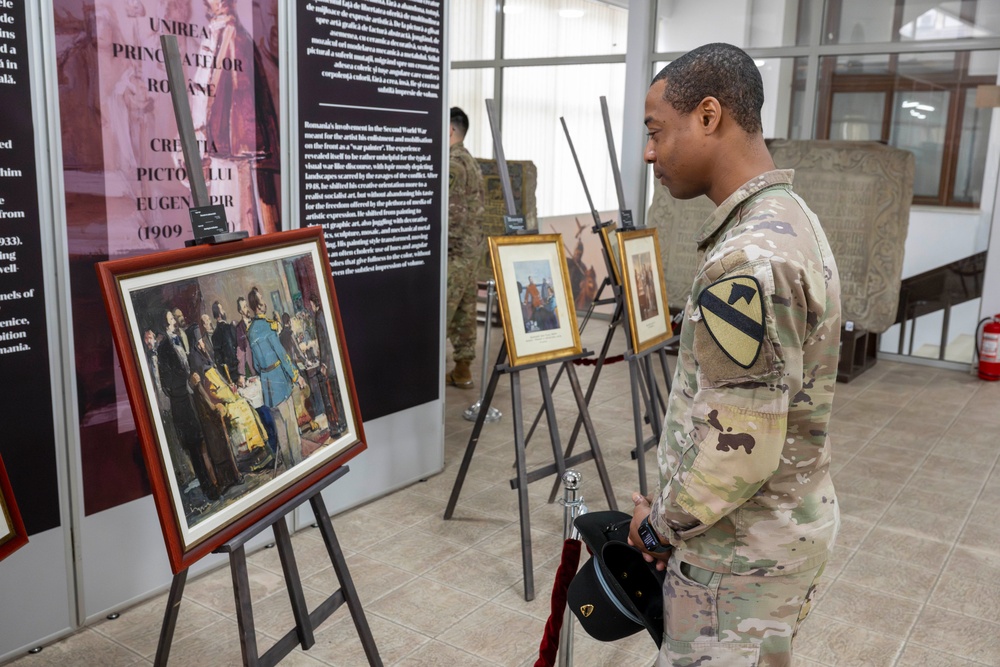 A Soldier observes oil Paintings at the Romanian National History Museum