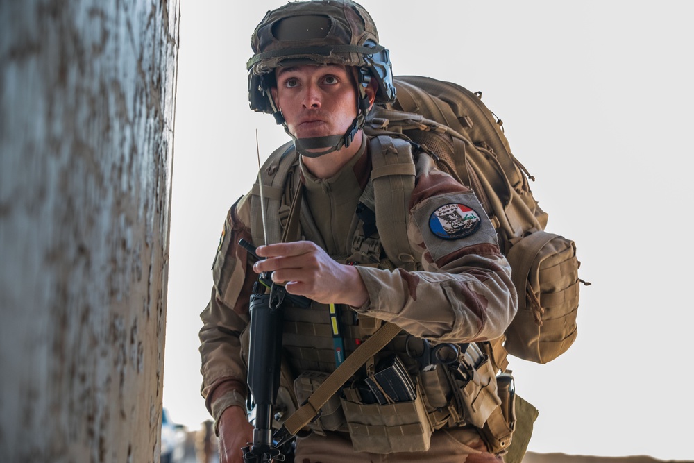 Coalition and K-9 Team Conduct Joint Explosive Detection Training