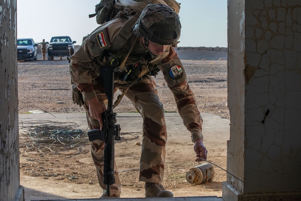 Coalition and K-9 Team Conduct Joint Explosive Detection Training