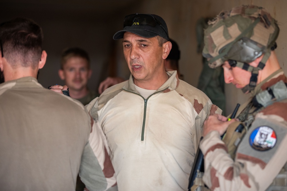 Coalition and K-9 Team Conduct Joint Explosive Detection Training