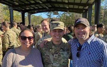 Sgt. Jackson and parents after EFMB ceremony