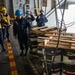 Nimitz Sailors Inspect Cargo During Resupply At Sea