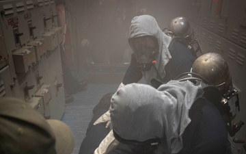 Nimitz Sailors Assess Casualties During Class Bravo Fire Drill