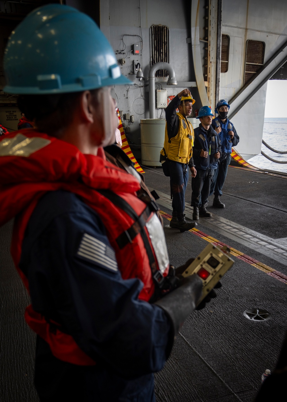 Nimitz Sailor Secures Cargo During Resupply At Sea