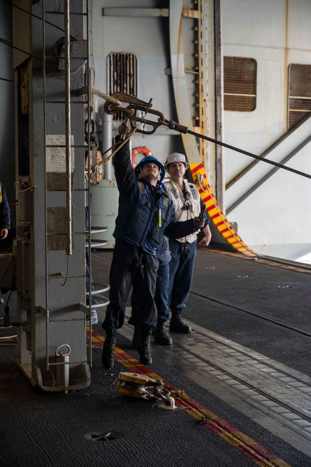 Nimitz Sailor Trips Pelican Hook During Resupply At Sea