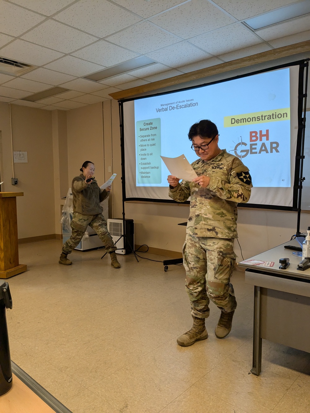 Trainees practice conducting BH GEAR training during the Train-the-Trainer course.