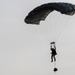 Italian Special Operation Forces members conduct free fall jumps during Emerald Warrior 25.1