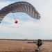 Italian Special Operation Forces members conduct free fall jumps during Emerald Warrior 25.1