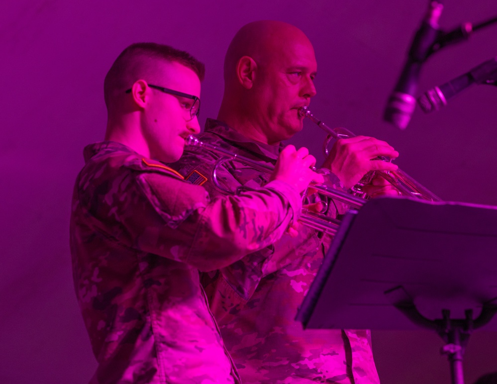 338th Army Band Promotes Spc. Ryan Miller at Zehnder’s Snowfest