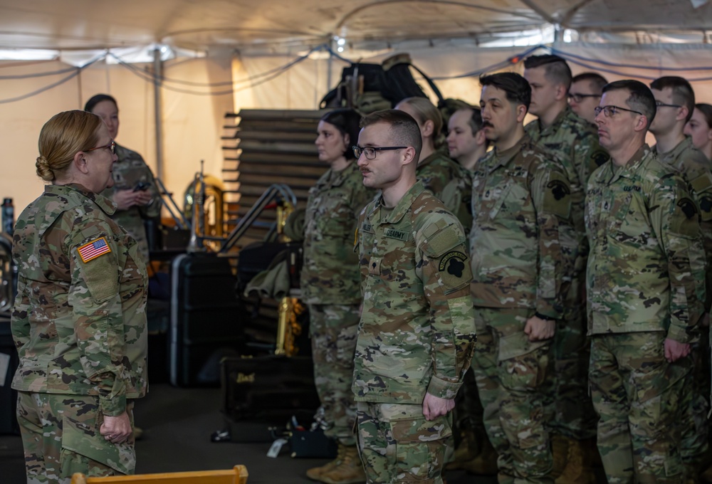 338th Army Band Promotes Spc. Ryan Miller at Zehnder’s Snowfest