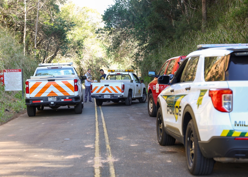 Personnel respond to a simulated car crash on the Kolekole Pass during an exercise at Lualualei Naval Complex Feb. 5, 2025.