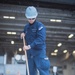 USS Ronald Reagan (CVN 76) Sailors clear snow